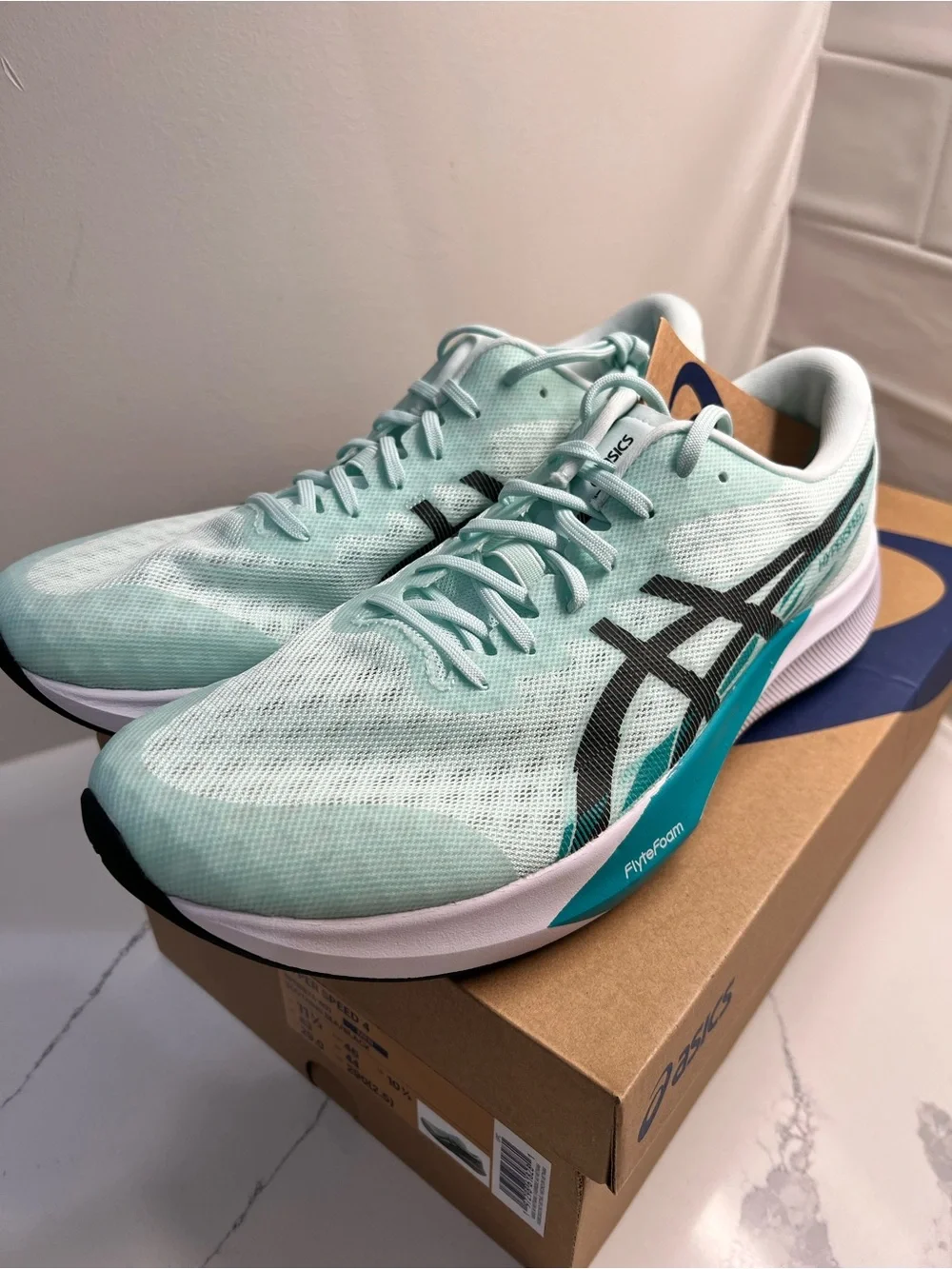 ASICS Hyperspeed 4 soothing sea/black men’s size 11.5/ women’s size 13